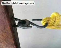 Install clothesline between walls