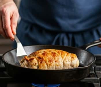 frying the chicken roulade