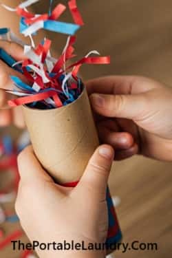 4. Confetti Poppers with Toilet Paper Rolls