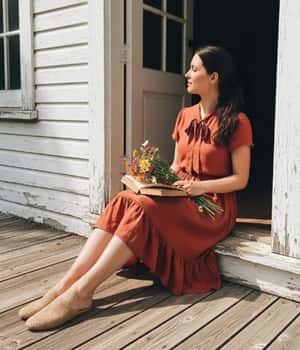 13. Ruffle Hem Dress with Tie-Neck Detail
