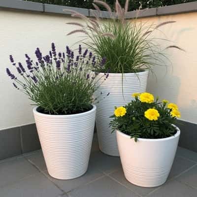 4. Stacked Ceramic Planter Trio for Tiny Patios