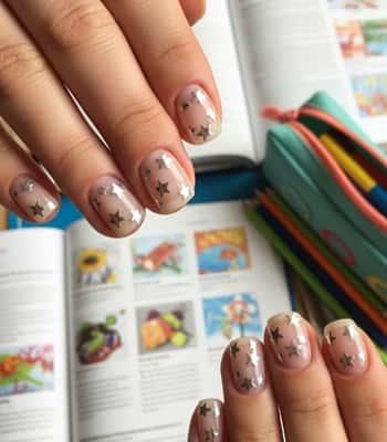 6. Minimal Star Stickers on Clear Gloss
