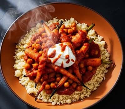 10. Harissa Roasted Carrots & Chickpeas over Couscous