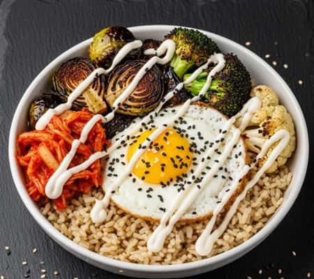 7. Korean-Style Kimchi and Brown Rice Bowl with Roasted Vegetables