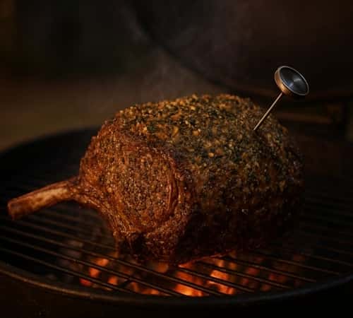 2. Charcoal-Grilled Prime Rib with Garlic Herb Crust