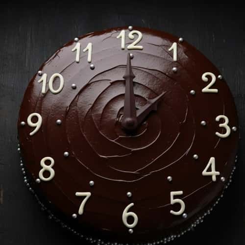 2. Midnight Clock Cake with Chocolate Ganache