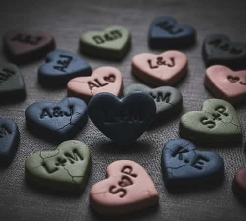 3. Heart-Shaped Pocket Token With Initials