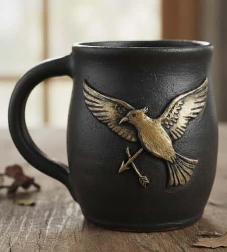 6. Hunger Games Mockingjay Badge Mug