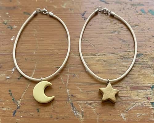 9. Star & Moon Pendant Set
