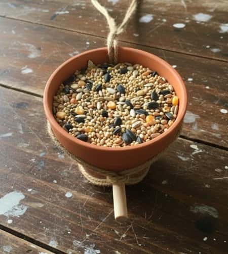 12. Clay Pot Hanging Bird Feeder (Garden Friendly)