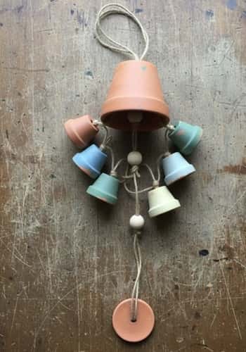 3. Clay Pot Bell Wind Chime (Sound + Style)
