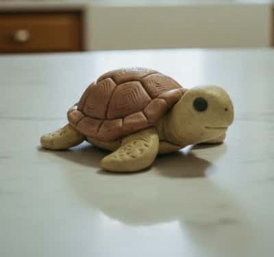 7. Mini Polymer Clay Turtle Figurine (Shelf Decor)