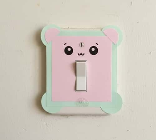 9. Kawaii Light Switch Decor (Paper + Tape Only)
