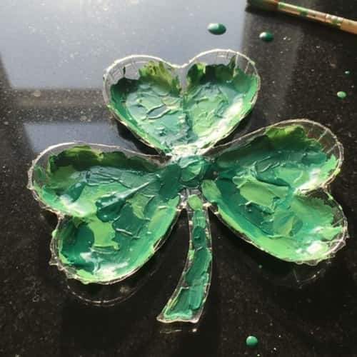 12. Plastic Bottle Bottom Shamrock Suncatcher