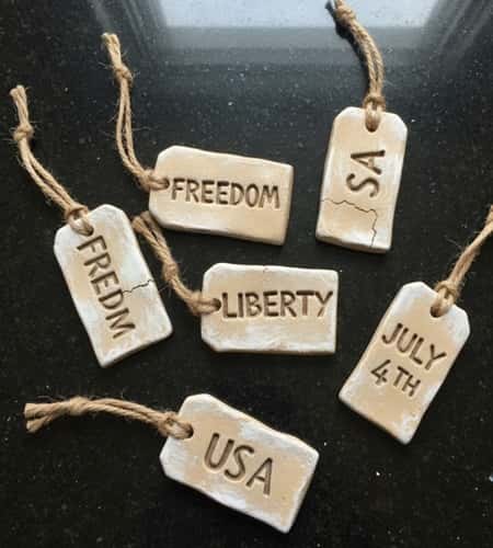 6. Rustic Clay Freedom Tags