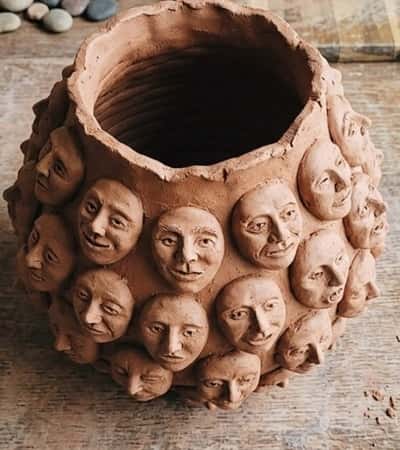 11. Clay Faces Abstract Vase