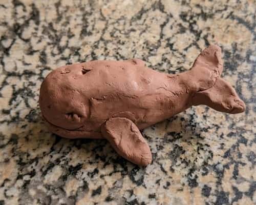 11. Clay Whale Sculpture
