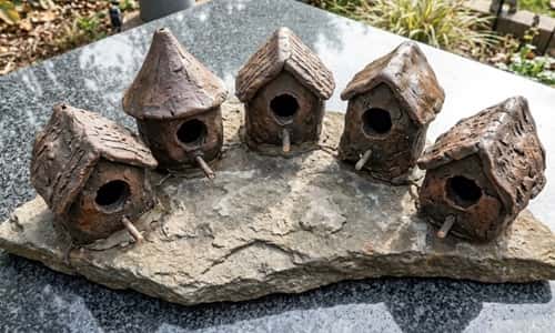 11. Rock Base Clay Bird House