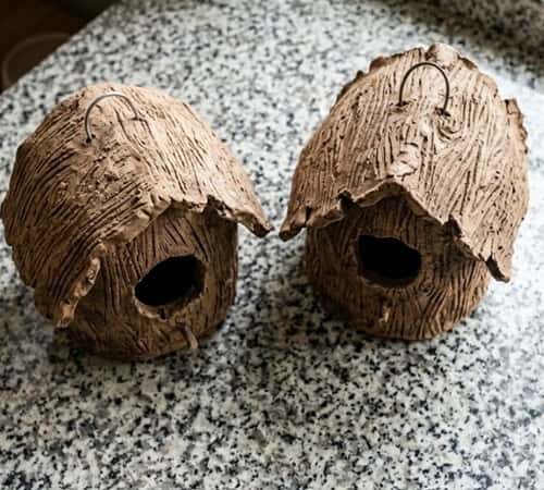 2. Rustic Farmhouse Clay Bird House