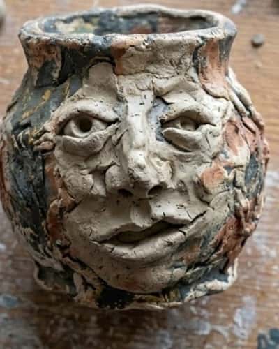 4. Face Sculpture Clay Vase
