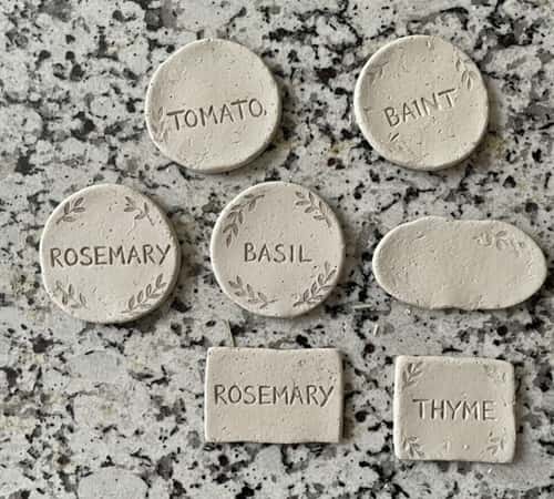 4. Rustic Hand-Carved Clay Plant Markers