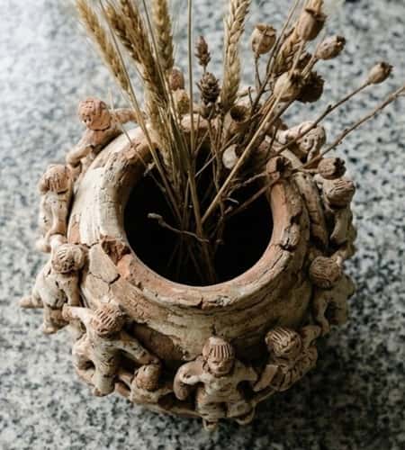 6. Clay People Vase