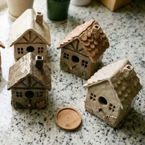 6. Mini Clay Cottage Bird House
