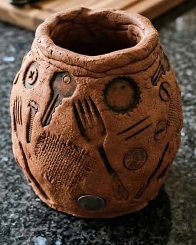 7. Stamped Pattern Clay Vase