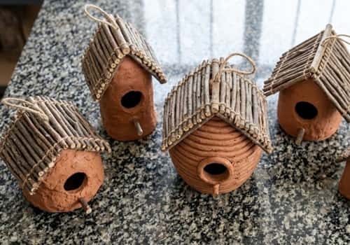 8. Clay Bird House with Stick Roof