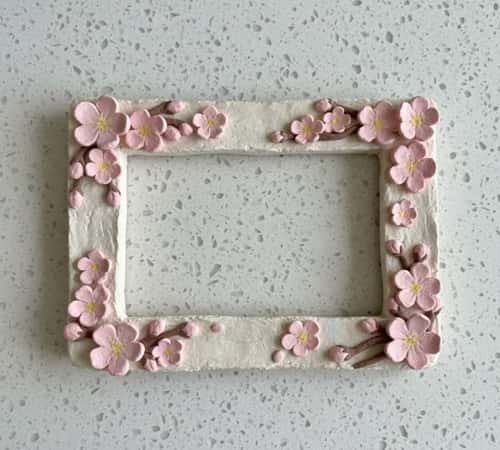 9. Cherry Blossom Clay Fridge Frame