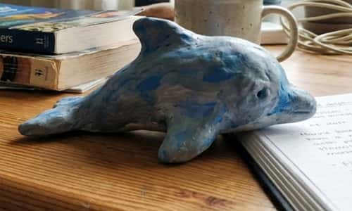 10. Clay Dolphin Desk Buddy