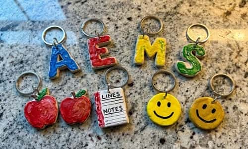 10. Personalized Clay Backpack Tag Charms