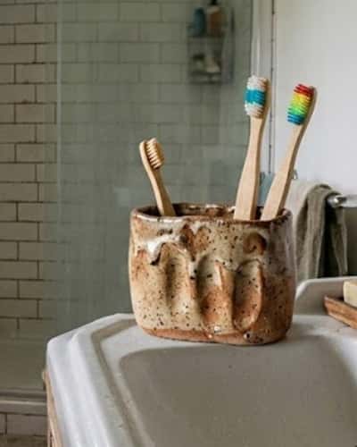2. Clay Toothbrush Holder with Finger Imprints