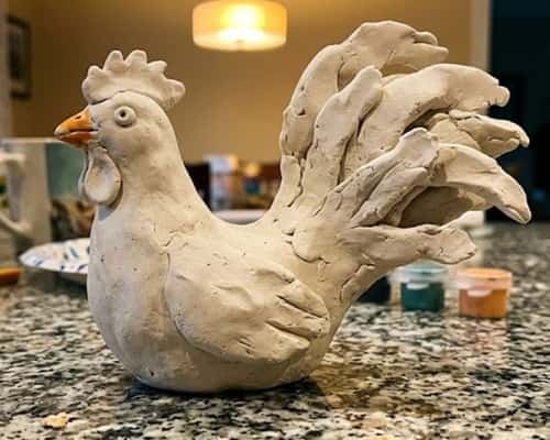 7. Proud Rooster with Fancy Tail Feathers