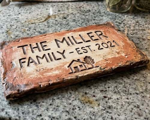 6. Personalized House Number Plaque or Name Plate