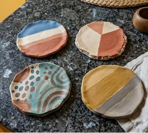 7. Layered Boho Coaster Set With Texture Mixing