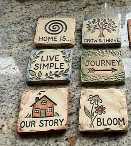 9. Story Tile Wall Squares With Symbols or Quotes