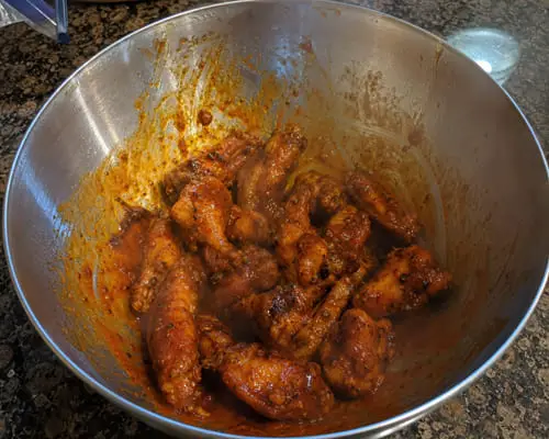 Step 6 - Tossing Wings in the Chipotle Lime Sauce