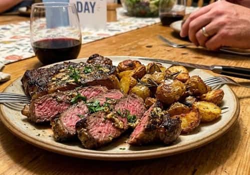 1. Garlic Butter Ribeye with Crispy Baby Potatoes