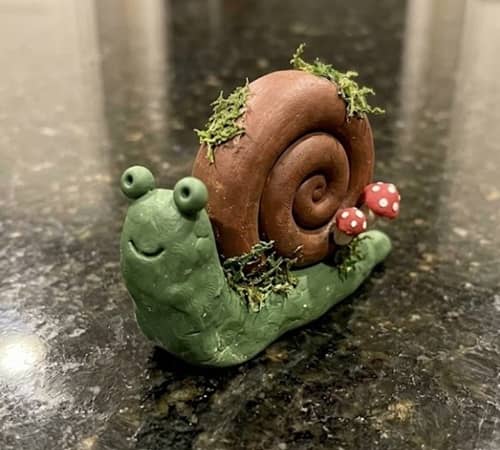 1. Mossy Forest Snail Creature