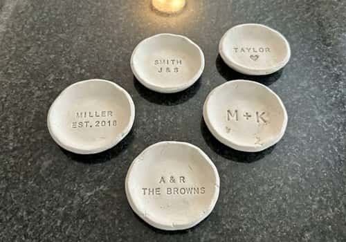 1. Personalized Family Name Ring Dishes