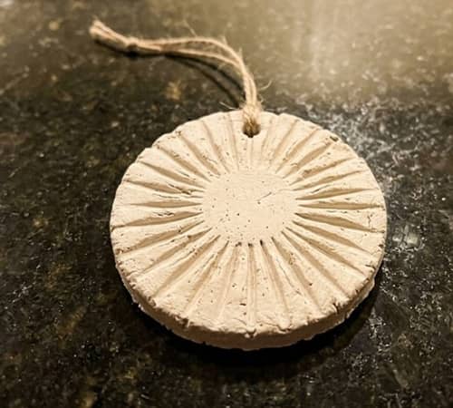 1. Sunburst Ripple Clay Ornament