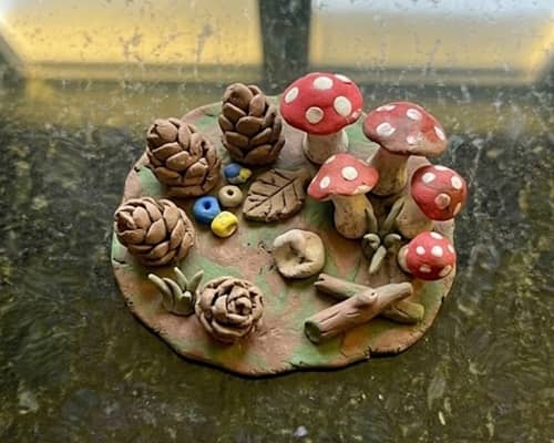 10. Pinecone Hide-and-Seek Clay Forest