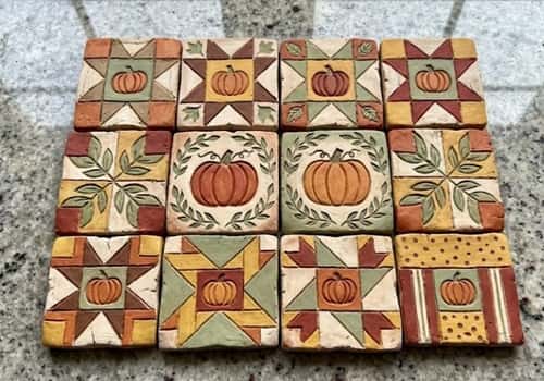 10. Pumpkin Quilt Tile Wall Decor