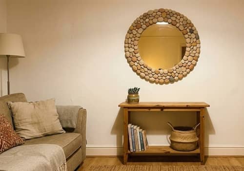 2. Clay Pebble Mirror Frame