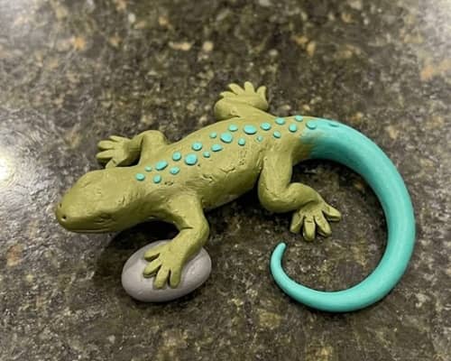5. Glowtail Pebble Lizard