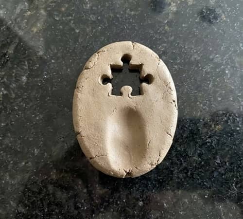 5. Puzzle Piece Clay Worry Stone