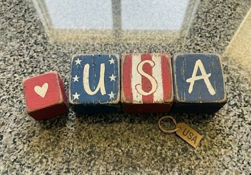 8. Distressed Wooden Block Freedom Stack