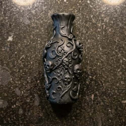 8. Haunted Potion Bottle Pen Holder