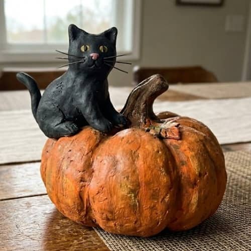 9. Hollow Black Cat Pumpkin Watcher